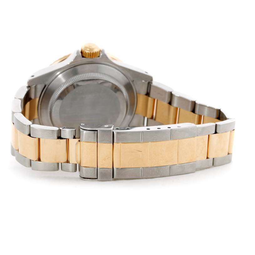 The image shows the back view and bracelet of a Rolex Submariner 16613 Men's Steel and Gold (two tone) Grey Dial 16613 Men's Steel and Gold (two tone) Grey Dial watch.