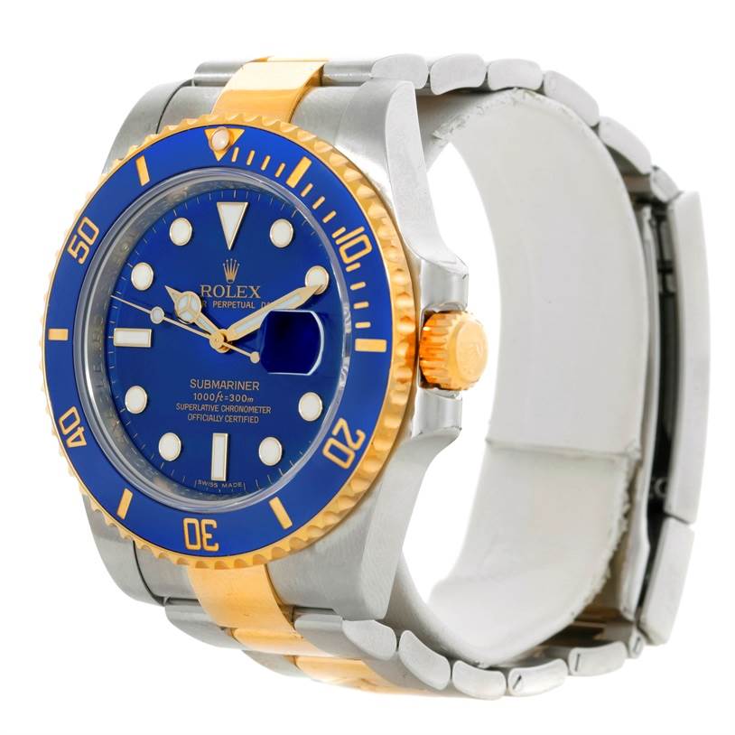The image shows a Rolex Submariner 116613 Men's Steel and Gold (two tone) Blue Dial 116613 Men's Steel and Gold (two tone) Blue Dial watch from an angled side view, highlighting the bezel, face, and part of the bracelet.