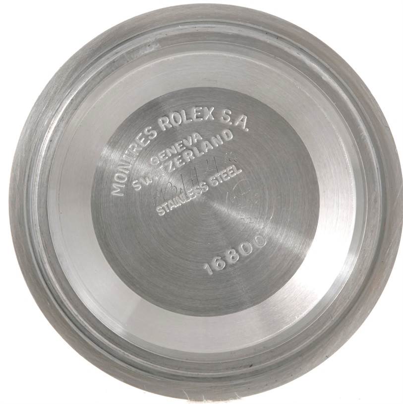 This image shows the inner case back of a Rolex Submariner 16803 Men's Steel and Gold (two tone) Blue Dial 16803 Men's Steel and Gold (two tone) Blue Dial watch model.