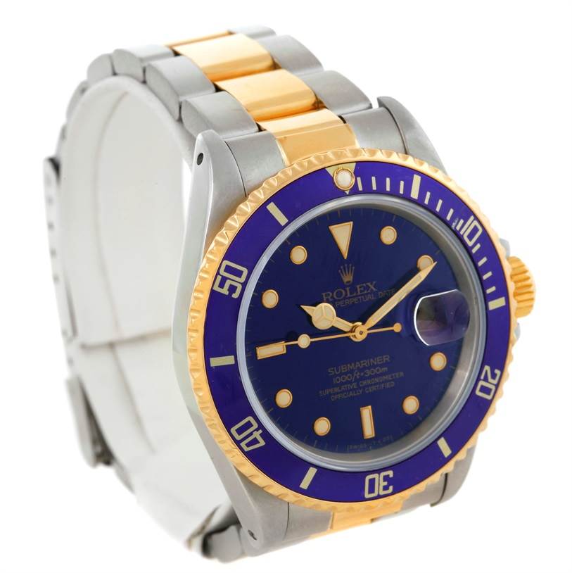 The image shows a Rolex Submariner 16803 Men's Steel and Gold (two tone) Blue Dial 16803 Men's Steel and Gold (two tone) Blue Dial watch angled to display its blue dial, gold bezel, and bracelet.