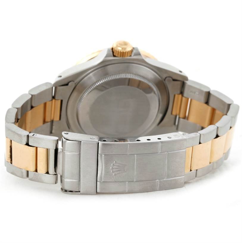 This image shows the back angle of a Rolex Submariner 16803 Men's Steel and Gold (two tone) Blue Dial 16803 Men's Steel and Gold (two tone) Blue Dial, highlighting the bracelet and clasp.