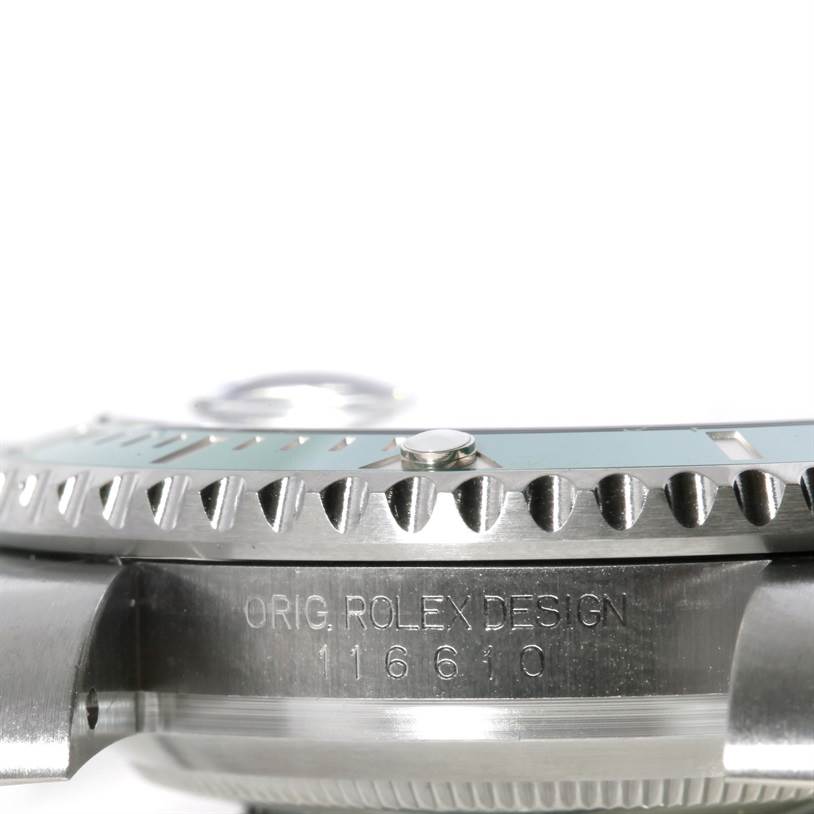 The image shows a side view of the bezel and case of the Rolex Submariner 116610LV Men's Stainless Steel Green Dial 116610LV Men's Stainless Steel Green Dial, showcasing the model number and design engraving.