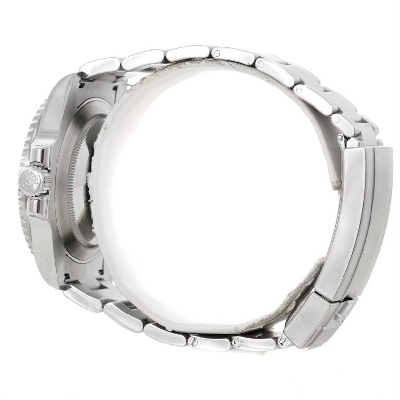 The image shows a side view of the Rolex Submariner 116610LV Men's Stainless Steel Green Dial 116610LV Men's Stainless Steel Green Dial, focusing on the crown, case, and bracelet.