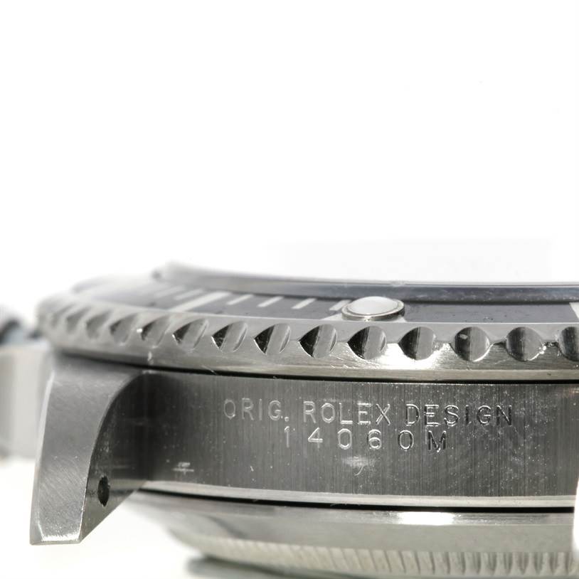 This angled close-up shows the side and bezel of a Rolex Submariner 14060 Men
s Stainless Steel Black Dial 14060 Men
s Stainless Steel Black Dial watch, highlighting the model number 14060M engraving.