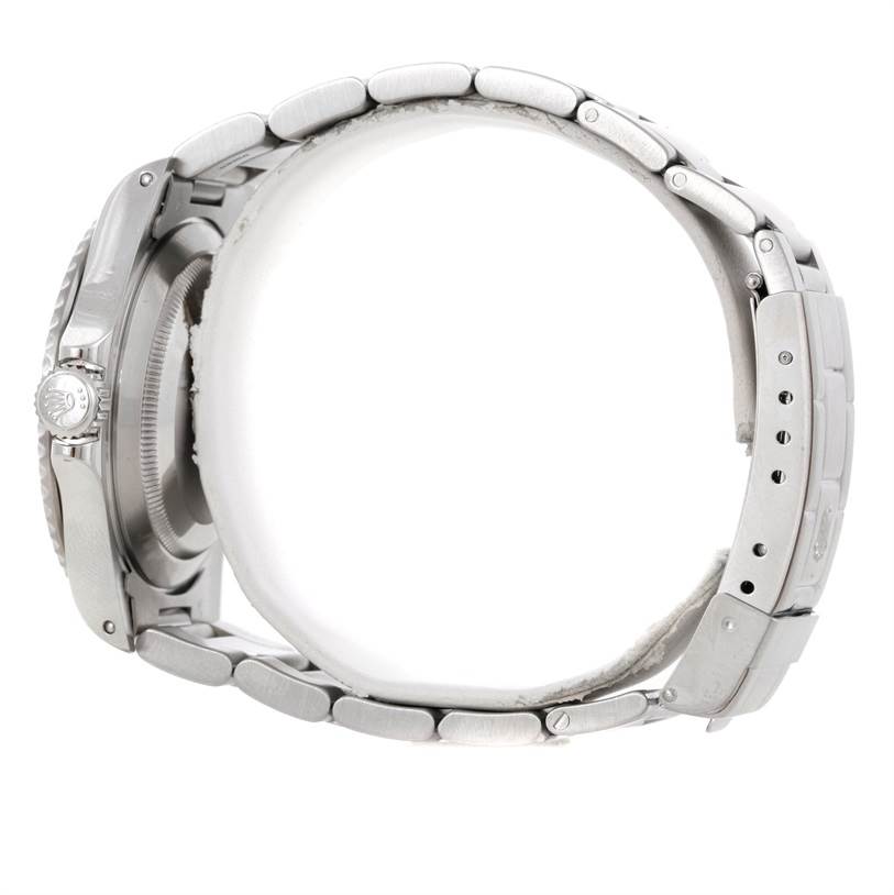 This image shows a Rolex Submariner 14060 Men
s Stainless Steel Black Dial 14060 Men
s Stainless Steel Black Dial watch in a side view, highlighting the case, bracelet, and crown.