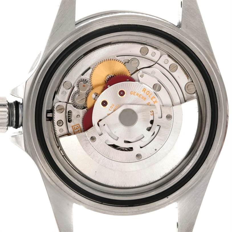 This image shows the back view of a Rolex Submariner 14060M Men
s Stainless Steel Black Dial 14060M Men
s Stainless Steel Black Dial, focusing on its internal movement components.