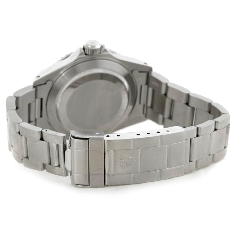 This image shows the backside and the stainless steel bracelet of a Rolex Submariner 14060M Men
s Stainless Steel Black Dial 14060M Men
s Stainless Steel Black Dial watch.