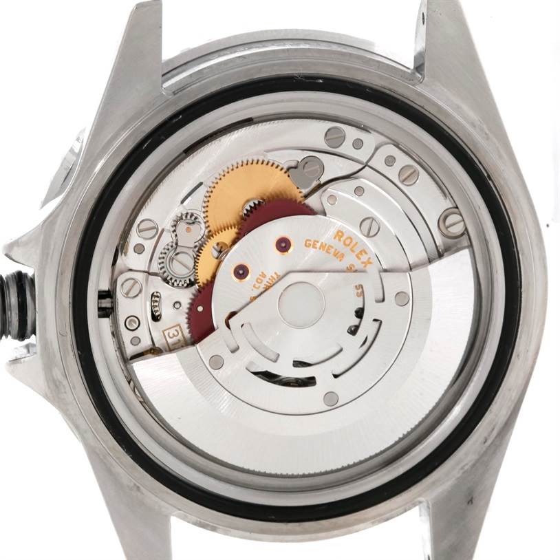 This image shows the internal mechanical movement of a Rolex Submariner 16610LV Men
s Stainless Steel Black Dial 16610LV Men
s Stainless Steel Black Dial watch from a rear view.
