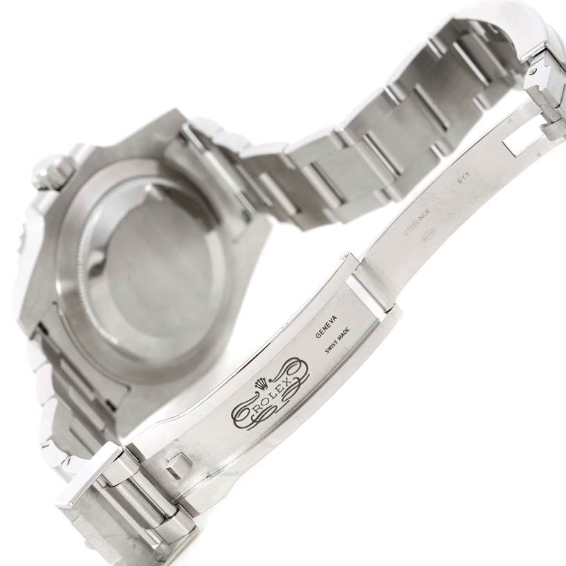 The image shows the back case and open clasp of a Rolex Submariner 114060 Men
s Stainless Steel Black Dial 114060 Men
s Stainless Steel Black Dial watch, highlighting the bracelet and clasp engravings.