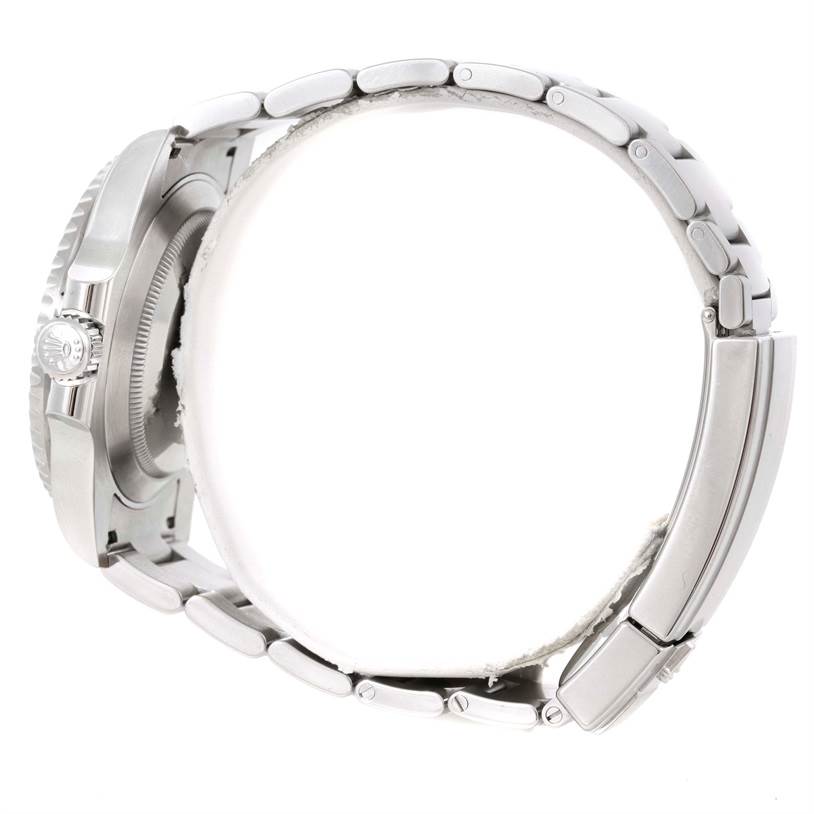 The image shows a side view of the Rolex Submariner 114060 Men
s Stainless Steel Black Dial 114060 Men
s Stainless Steel Black Dial watch, highlighting its case, crown, and bracelet.