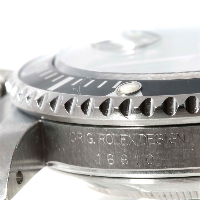This close-up angle showcases the side engraving, bezel, and partial crystal of the Rolex Submariner 16610 Men
s Stainless Steel Black Dial 16610 Men
s Stainless Steel Black Dial model 16610.