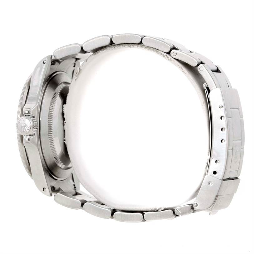 This image shows a side view of the Rolex Submariner 16610 Men
s Stainless Steel Black Dial 16610 Men
s Stainless Steel Black Dial model, focusing on its stainless steel case and bracelet.