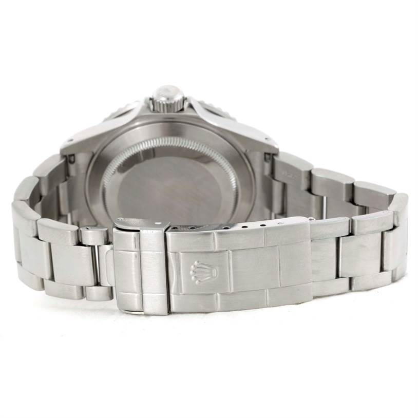 This image shows the back case and bracelet clasp of a Rolex Submariner 16610 Men
s Stainless Steel Black Dial 16610 Men
s Stainless Steel Black Dial watch from a rear view angle.