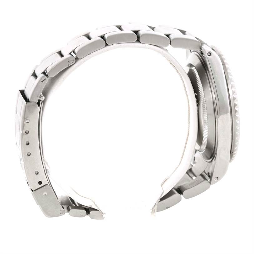 The image shows a side view of the Rolex Submariner 16610 Men
s Stainless Steel Black Dial 16610 Men
s Stainless Steel Black Dial watch, focusing on the bracelet and case.