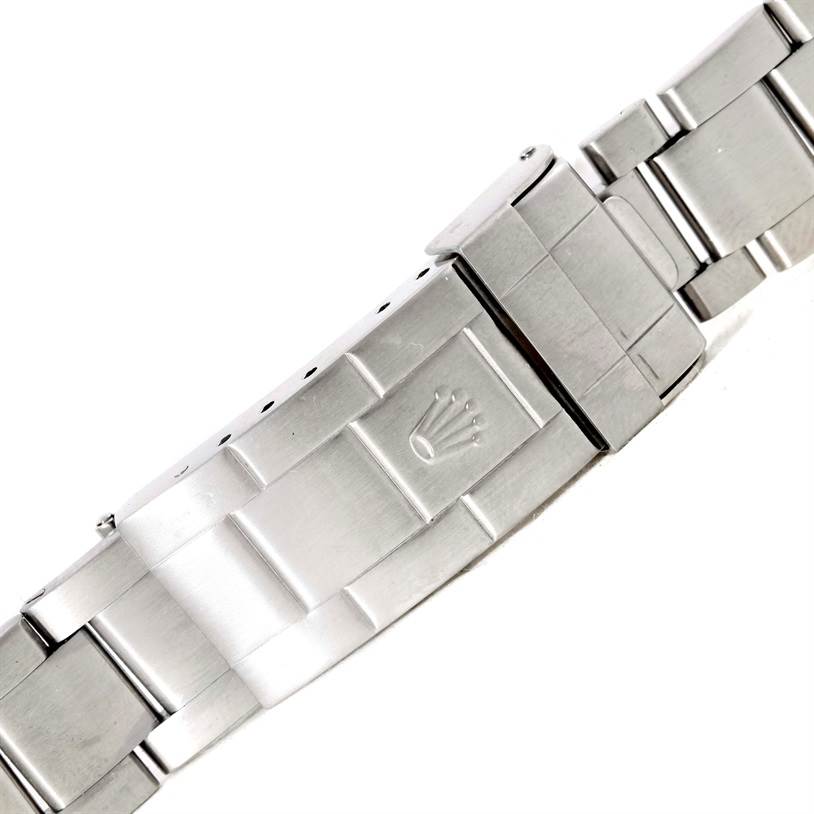 This image shows the clasp and part of the bracelet of a Rolex Submariner 16610 Men
s Stainless Steel Black Dial 16610 Men
s Stainless Steel Black Dial watch at a slight angle.