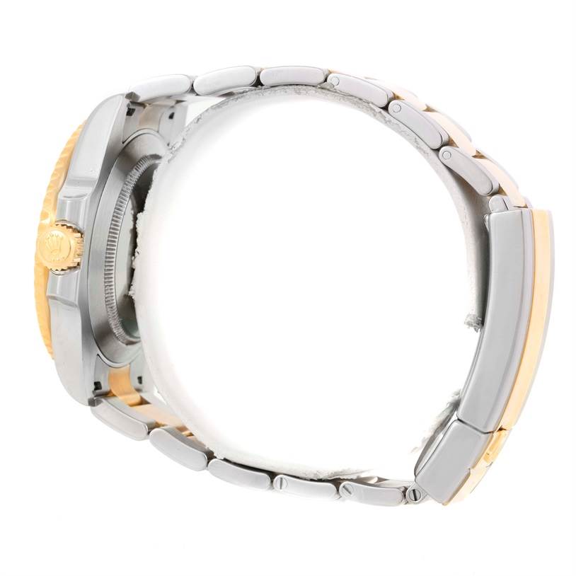 The image shows a side view of a Rolex Submariner 116613 Men's Steel and Gold (two tone) Black Dial 116613 Men's Steel and Gold (two tone) Black Dial watch, highlighting the bracelet, case, and crown.