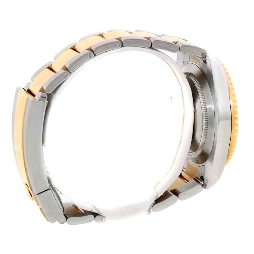 Side view showing the bracelet and the case back of the Rolex Submariner 116613 Men's Steel and Gold (two tone) Black Dial 116613 Men's Steel and Gold (two tone) Black Dial watch.