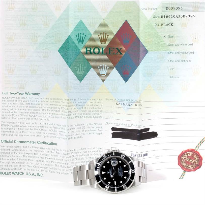 The image shows a front view of a Rolex Submariner 16610 Men
s Stainless Steel Black Dial 16610 Men
s Stainless Steel Black Dial watch accompanied by its warranty and official chronometer certification papers.