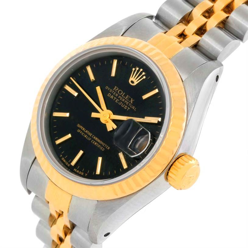 This image shows a close-up angle of the Rolex Datejust 69173 Women's Stainless Steel Black Dial 69173 Women's Stainless Steel Black Dial watch, highlighting the black dial, gold bezel, and two-tone bracelet.
