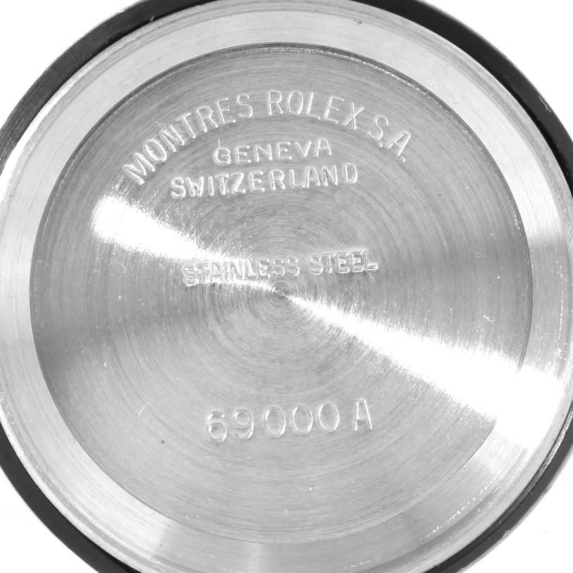 This image shows the inside of the case back of a Rolex Datejust 69173 Women's Stainless Steel Champagne Dial 69173 Women's Stainless Steel Champagne Dial watch, displaying "69000A" and "Geneva Switzerland."
