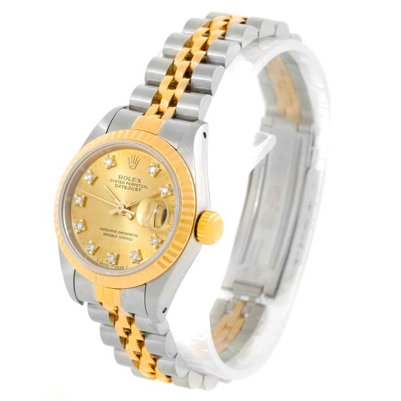 The image shows a Rolex Datejust 69173 Women's Stainless Steel Champagne Dial 69173 Women's Stainless Steel Champagne Dial watch at a slight side angle, highlighting the two-tone bracelet, gold dial, and fluted bezel.