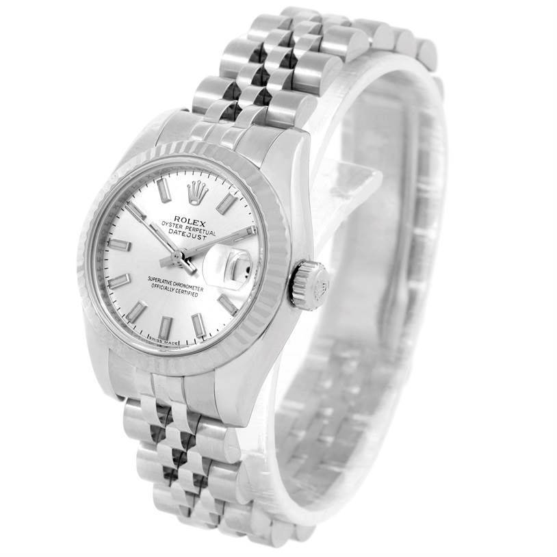 The image shows a Rolex Datejust 179174 Women
s Stainless Steel Silver Dial 179174 Women
s Stainless Steel Silver Dial watch at an angled side view, highlighting the face, bezel, crown, and bracelet.