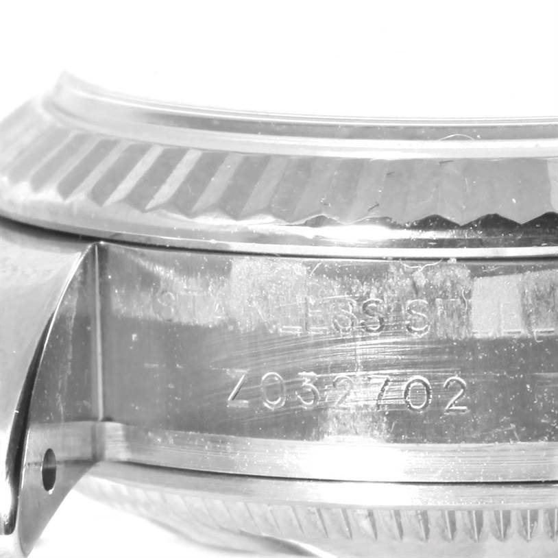 This image shows a close-up of the case side and bezel of a Rolex Datejust 179174 Women
s Stainless Steel Silver Dial 179174 Women
s Stainless Steel Silver Dial watch.