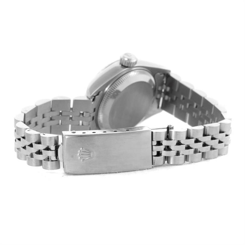 The image shows the backside and clasp of the Rolex Datejust 79174 Women's Stainless Steel White Dial 79174 Women's Stainless Steel White Dial watch, focusing on the bracelet and case back.