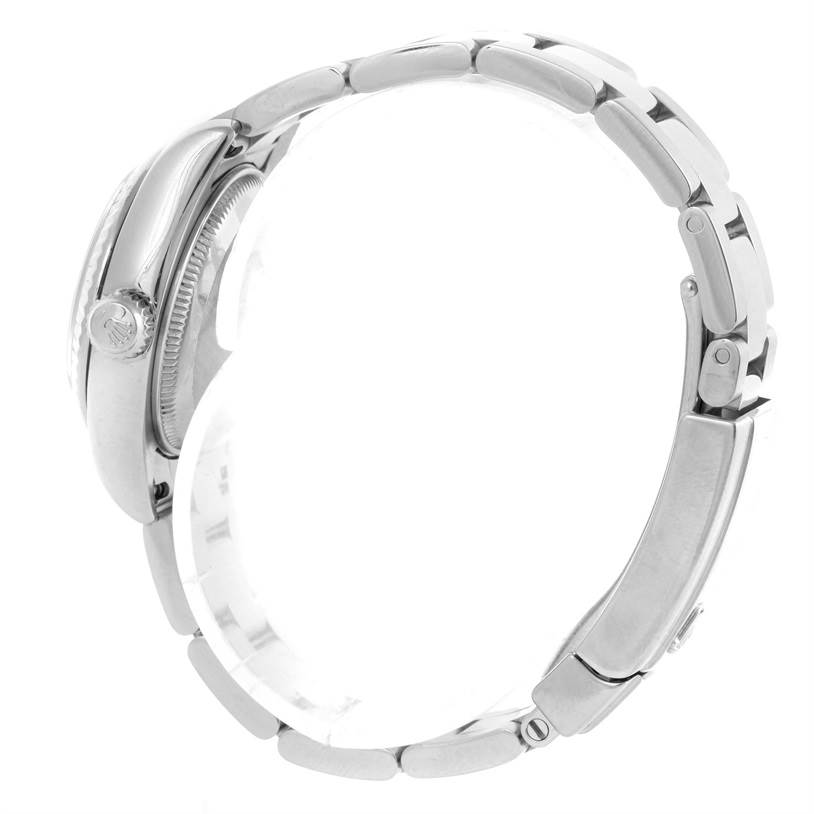 The image shows the side view of a Rolex Datejust 179174 Women's Stainless Steel Pink Dial 179174 Women's Stainless Steel Pink Dial watch, highlighting the crown and part of the bracelet.