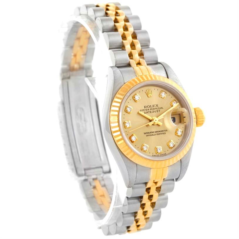 The image shows a Rolex Datejust 69173 Women's Stainless Steel Champagne Dial 69173 Women's Stainless Steel Champagne Dial watch at a slight angle, highlighting its gold and silver jubilee bracelet, face, fluted bezel, and dial.