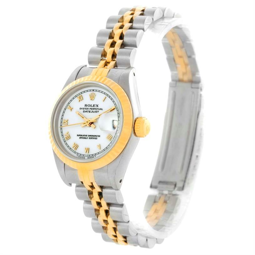 This Rolex Datejust 69173 Women
s Stainless Steel White Dial 69173 Women
s Stainless Steel White Dial watch is shown at a slight angle, highlighting its face, bezel, and bi-metal bracelet.