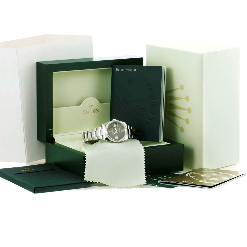The image shows a Rolex Datejust 116244 Men's Stainless Steel Brown Dial 116244 Men's Stainless Steel Brown Dial watch displayed in its box, with manuals, packaging, and a cleaning cloth.