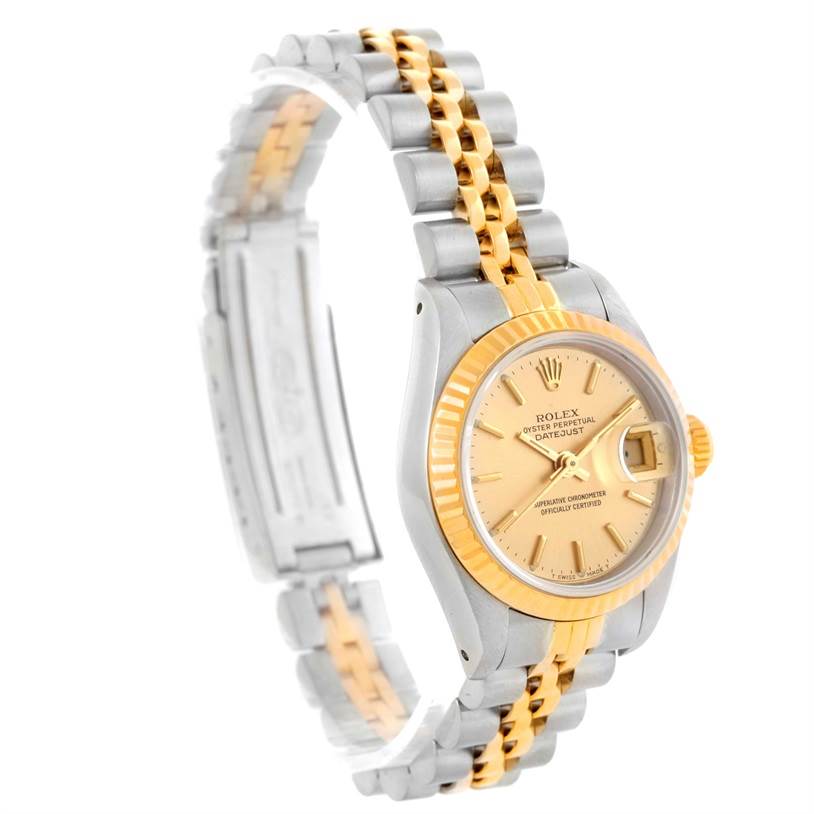 This image shows the front and side of the Rolex Datejust 69173 Women's Stainless Steel Champagne Dial 69173 Women's Stainless Steel Champagne Dial, highlighting its dial, fluted bezel, and Jubilee bracelet.