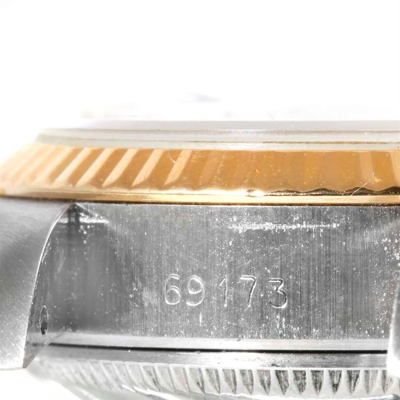 The image shows a close-up side view of the bezel, case, and reference number "69173" on a Rolex Datejust 69173 Women's Stainless Steel Champagne Dial 69173 Women's Stainless Steel Champagne Dial watch.