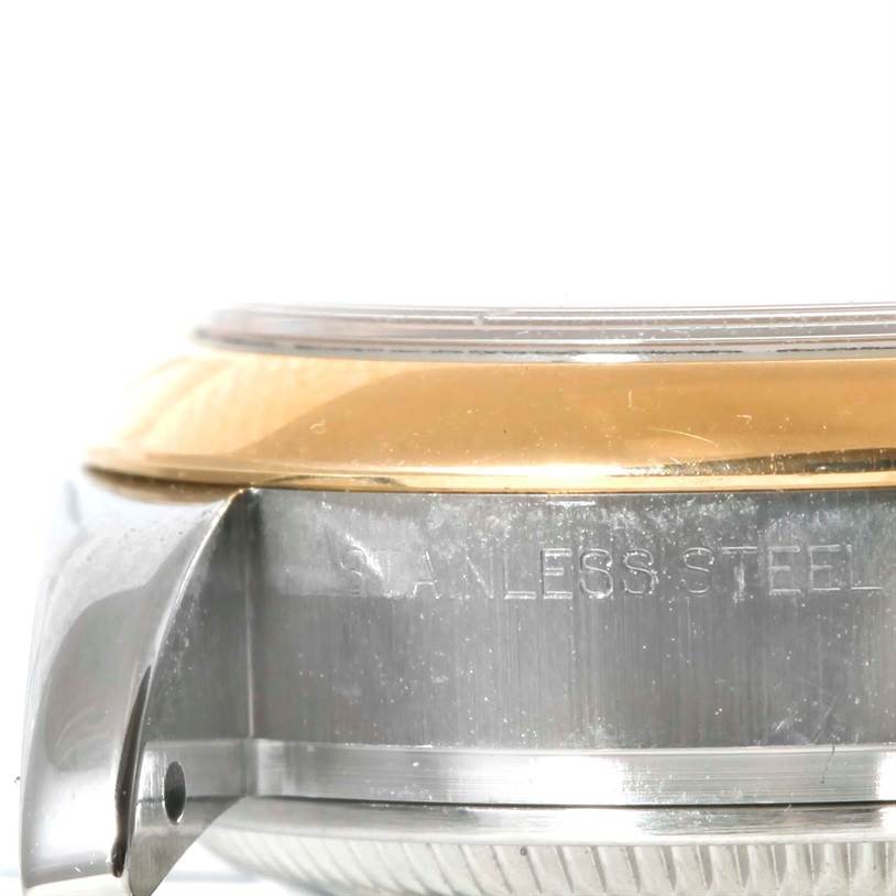 This image shows a close-up side view of the case, bezel, and part of the lug of a Rolex Datejust 179163 Women's Steel and Gold (two tone) Silver Dial 179163 Women's Steel and Gold (two tone) Silver Dial watch.