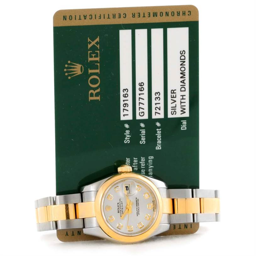 The image shows a Rolex Datejust 179163 Women's Steel and Gold (two tone) Silver Dial 179163 Women's Steel and Gold (two tone) Silver Dial watch laid flat with its certification card visible in the background.