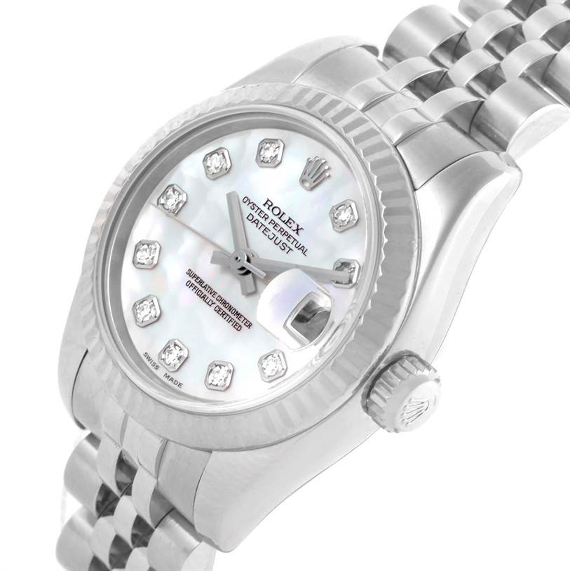 The image shows a Rolex Datejust 179174 Women's Stainless Steel Mother of Pearl Dial 179174 Women's Stainless Steel Mother of Pearl Dial watch from a slightly tilted top-down angle, highlighting the dial, bezel, and bracelet.