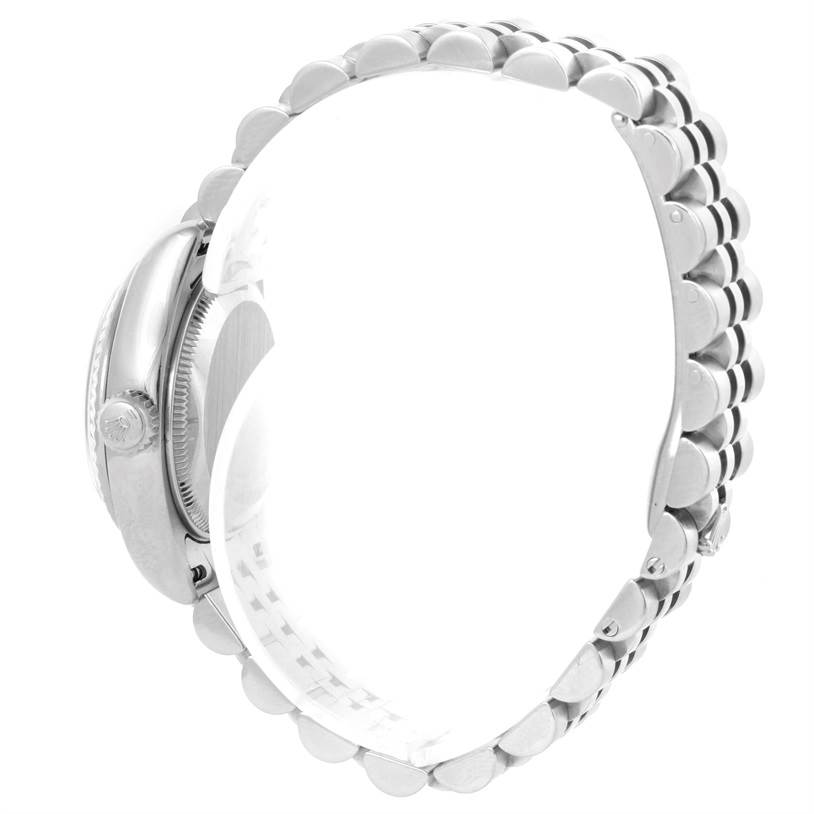 This image shows a side profile view of the Rolex Datejust 179174 Women's Stainless Steel Mother of Pearl Dial 179174 Women's Stainless Steel Mother of Pearl Dial watch, featuring the crown, case, and bracelet.