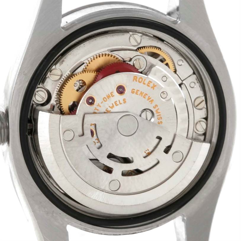 The image shows the back view of a Rolex Datejust 179174 Women's Stainless Steel Mother of Pearl Dial 179174 Women's Stainless Steel Mother of Pearl Dial watch, displaying its automatic movement mechanism.