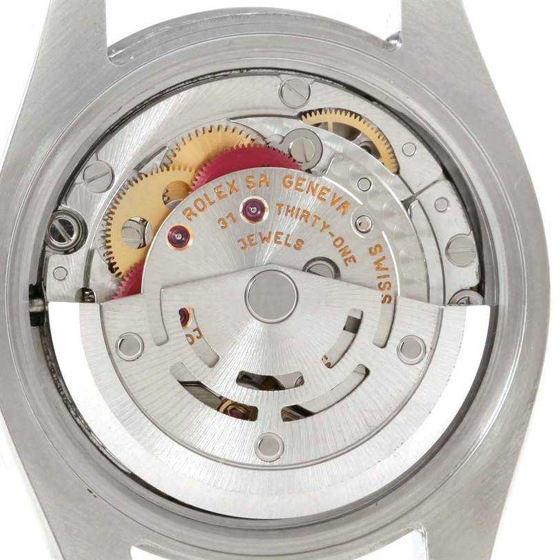This image shows the inner mechanism and movement of a Rolex Datejust 179174 Women's Stainless Steel Mother of Pearl Dial 179174 Women's Stainless Steel Mother of Pearl Dial watch from the back.