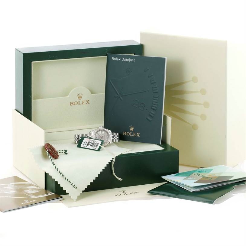 The image shows a Rolex Datejust 179174 Women's Stainless Steel Mother of Pearl Dial 179174 Women's Stainless Steel Mother of Pearl Dial watch with its box, cleaning cloth, tags, and instruction booklets from a slightly elevated angle.