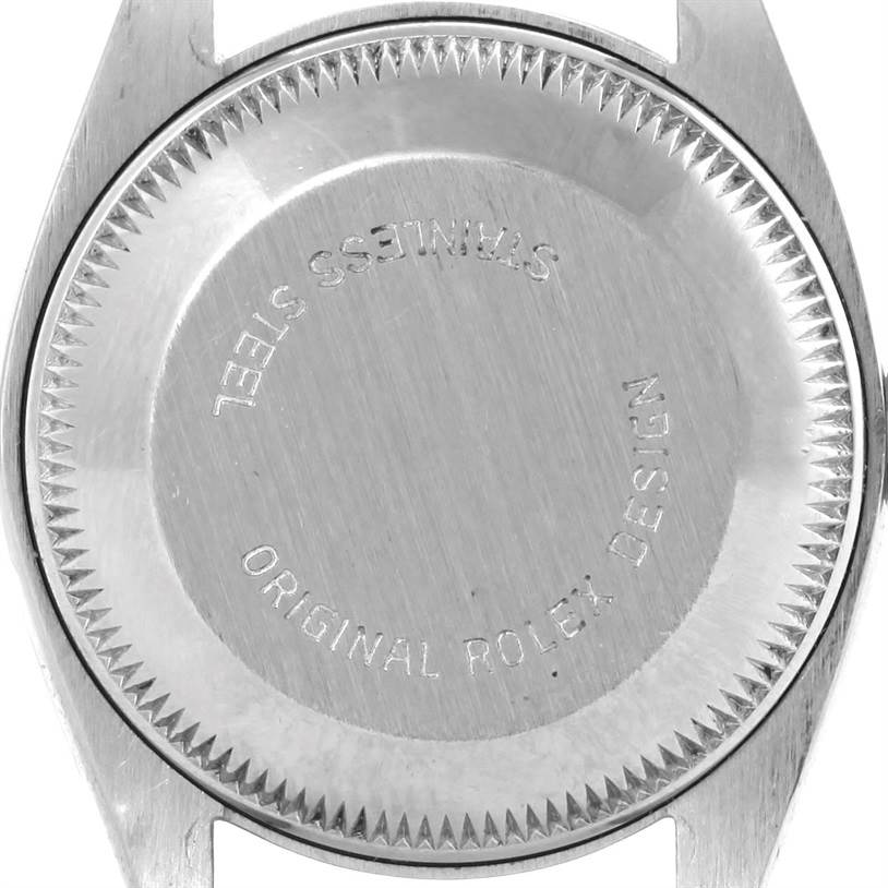 This image shows the back case of a Rolex Datejust 6917 Women's Stainless Steel Champagne Dial 6917 Women's Stainless Steel Champagne Dial watch, displaying "STAINLESS STEEL" and "ORIGINAL ROLEX DESIGN."