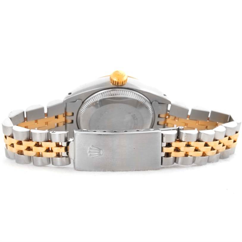 The image shows the back view of a Rolex Datejust 6917 Women's Stainless Steel Champagne Dial 6917 Women's Stainless Steel Champagne Dial watch, highlighting its two-tone bracelet and closed clasp.