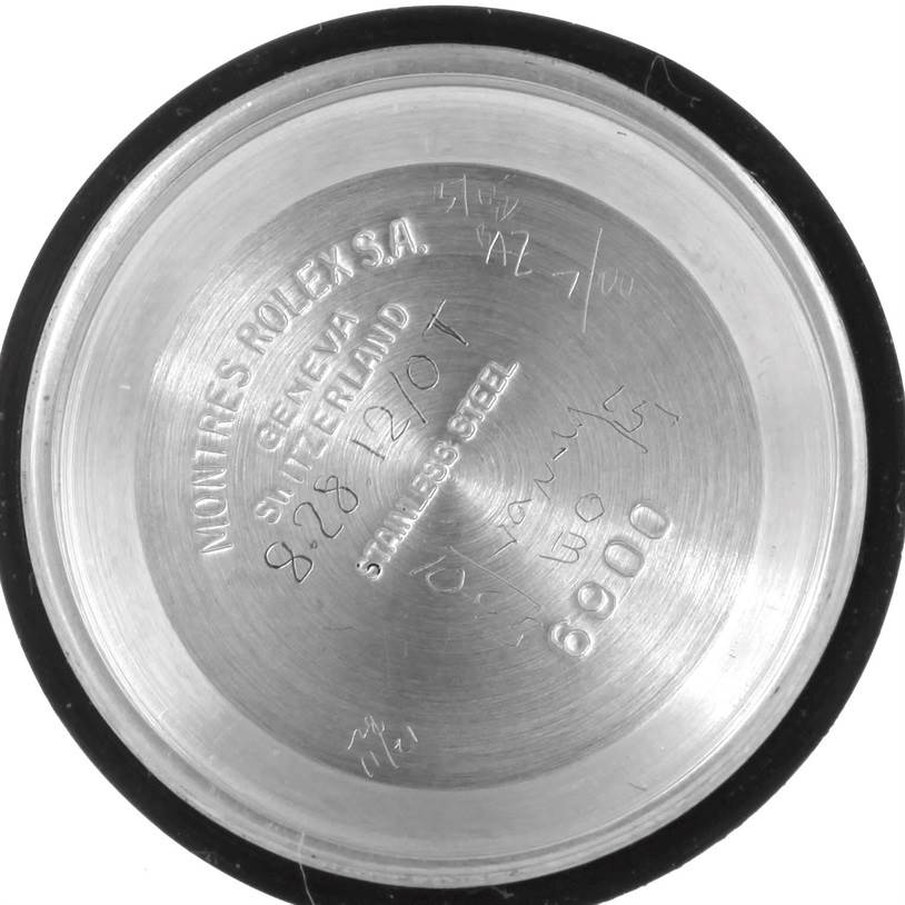 The image shows the inside of the case back of a Rolex Datejust 6917 Women's Stainless Steel Champagne Dial 6917 Women's Stainless Steel Champagne Dial watch, featuring engraved details.