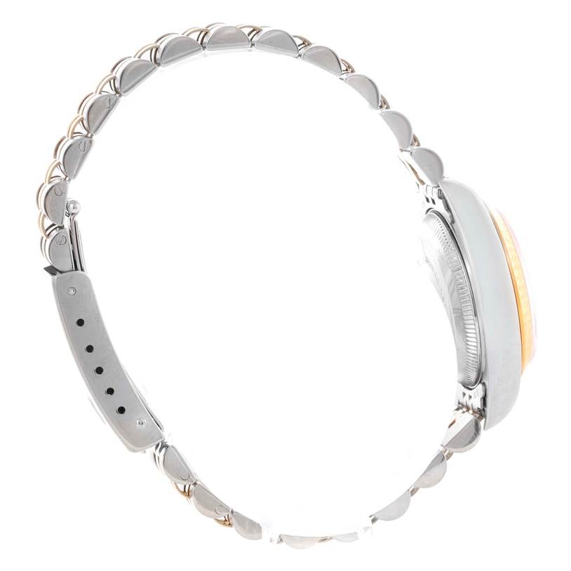 The image shows a side angle of a Rolex Datejust 69173 Women
s Stainless Steel Black Dial 69173 Women
s Stainless Steel Black Dial watch, highlighting its bracelet and partially its case.