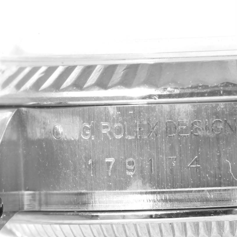 This image shows a close-up of the case side of the Rolex Datejust 179174 Women
s Stainless Steel Silver Dial 179174 Women
s Stainless Steel Silver Dial watch, focusing on the model number and Rolex engraving.