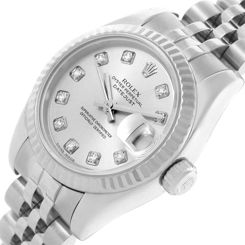 The image shows a close-up of a Rolex Datejust 179174 Women
s Stainless Steel Silver Dial 179174 Women
s Stainless Steel Silver Dial watch face, including the crown, bezel, and part of the Jubilee bracelet.