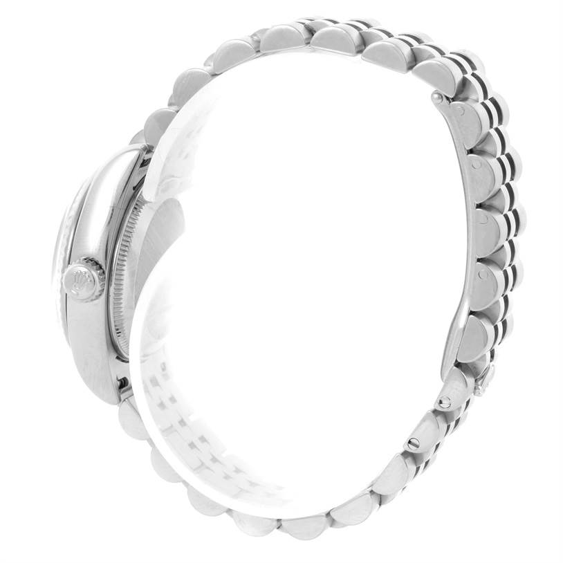 This image shows the side profile of a Rolex Datejust 179174 Women
s Stainless Steel Silver Dial 179174 Women
s Stainless Steel Silver Dial watch, highlighting the crown and bracelet links.