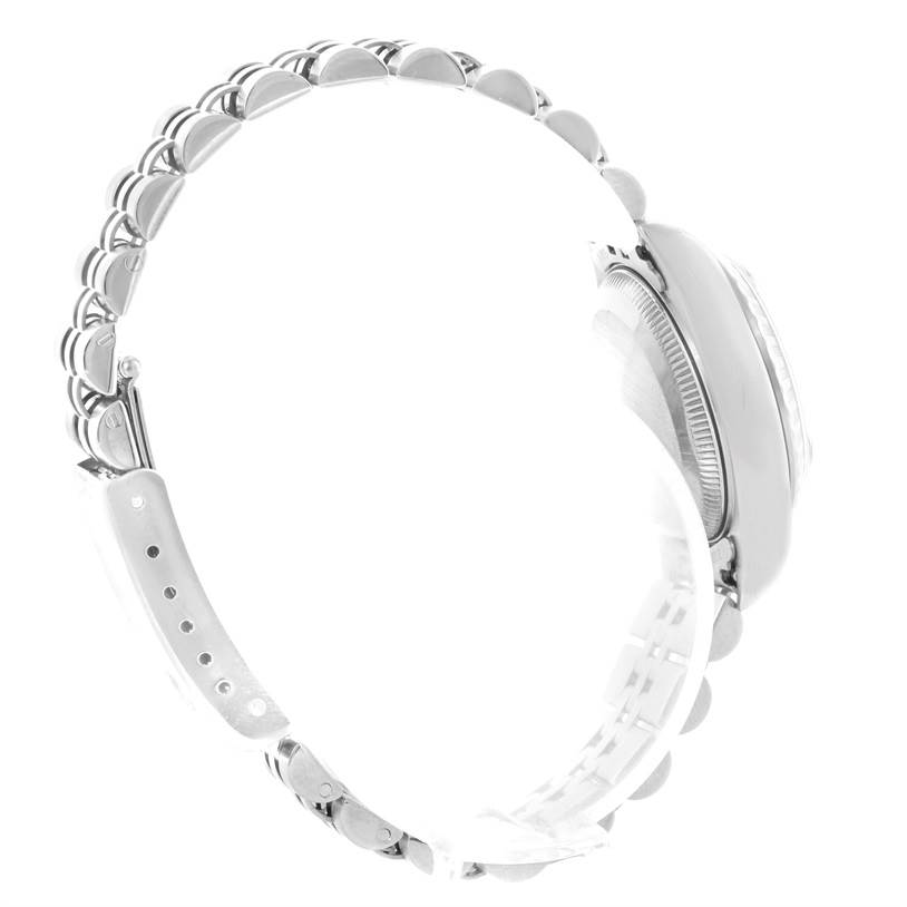 The image shows a side view of the Rolex Datejust 69240 Women's Stainless Steel Grey Dial 69240 Women's Stainless Steel Grey Dial's case, bezel, and bracelet without showcasing the dial.