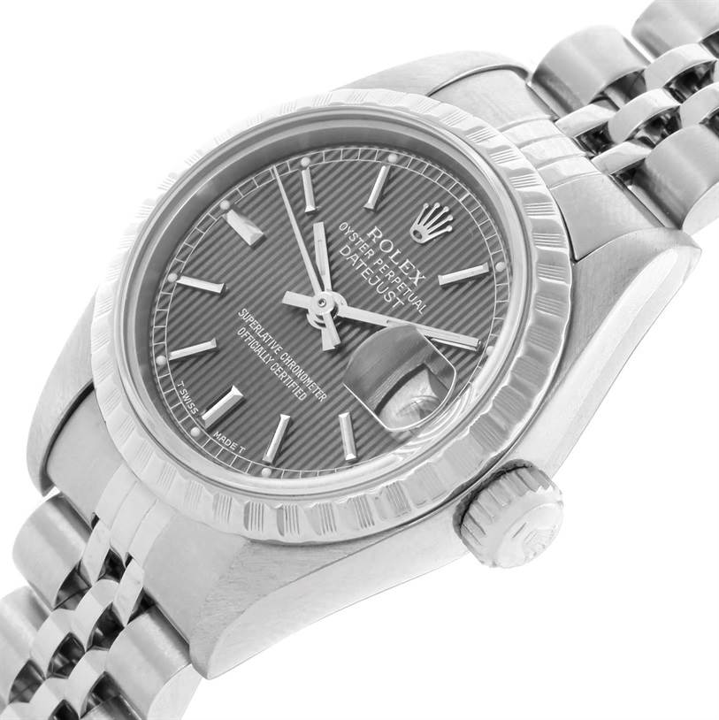 This image shows a close-up view of the dial, bezel, and crown of a Rolex Datejust 69240 Women's Stainless Steel Grey Dial 69240 Women's Stainless Steel Grey Dial watch from an angled perspective.